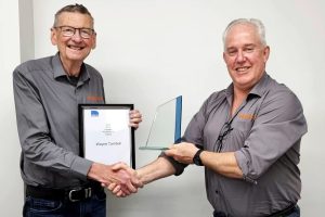 Wayne Turnbull receiving his award and certificate of NSW State Industry Professional of the Year for 2023